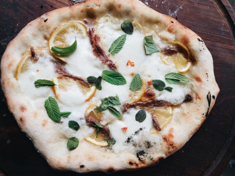 Why Pizza Romanow is the Go-To Spot for Pizza in Town